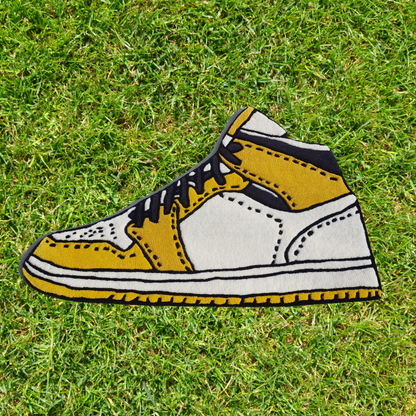 Image of a sneaker rug designed to look like a yellow shoe