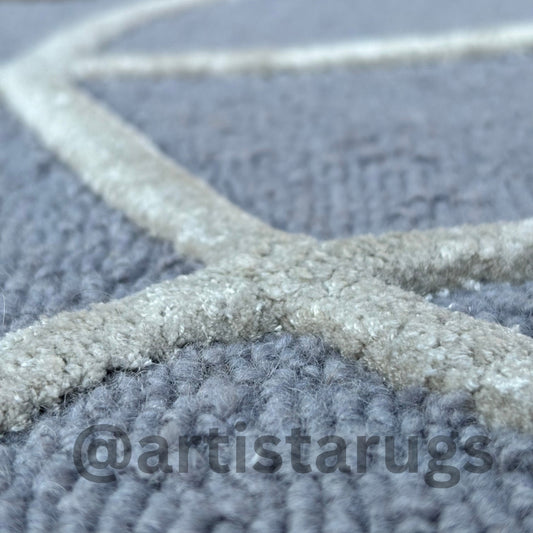 Image of a textured Arches rug with a geometric pattern