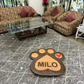 Diagonal view of paw rug with pet's name